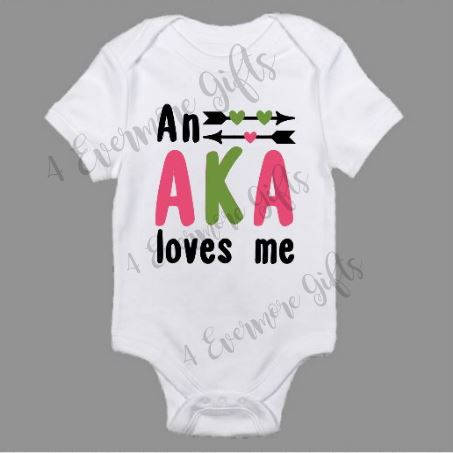 An AKA Loves Me Baby Body Suit